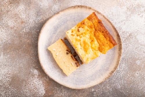 Preview: Сottage cheese Сasserole, Curd cake, with dried apricots and raisins on brown concrete, top view, cl