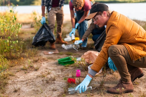 Preview: Volunteers collecting plastic waste during nature cleanup event