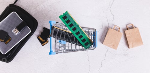Preview: Computer memory modules RAM in a cart on a desktop top view web banner