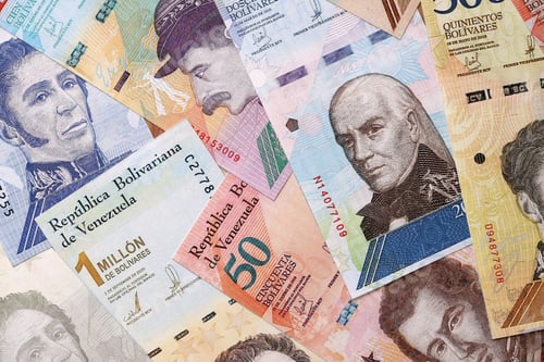 Preview: Venezuelan Bolivar currency money bills in big amount. Stack of VED currency banknotes