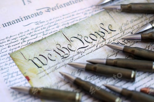 Preview: The second amendment and gun control in america concept. Bullets on american constitution