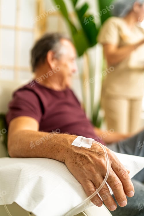 Preview: Older man receiving intravenous vitamin therapy
