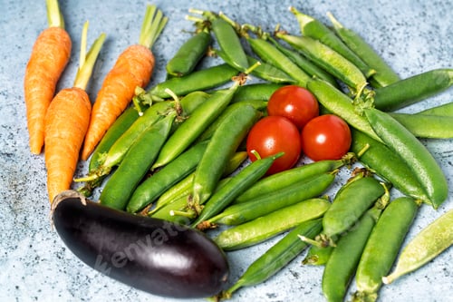 Preview: Fresh vegetables including peas, carrots, tomatoes and eggplant