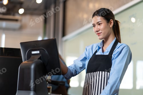 Preview: Female barista takes customer order in coffee shop startup business