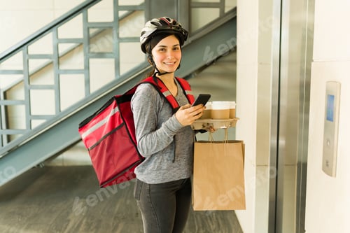 Preview: Beautiful woman making a food delivery