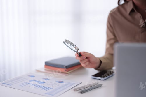 Preview: Business Professional Analyst Examine Financial Report Chart Data With Magnifying Glass Research Ana