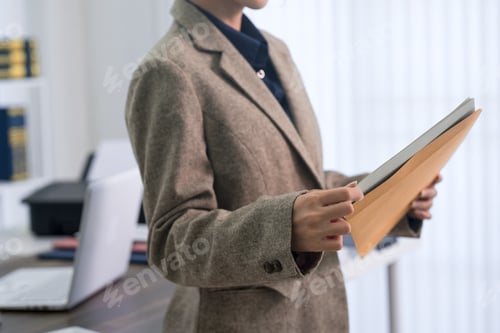 Preview: Professional Lawyer Women Holding File Folder Documents Standing Office Workspace Reviewing Legal Pa