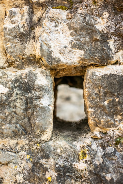 Preview: Close up of ancient stone wall opening in historic Kotor Montenegro old town