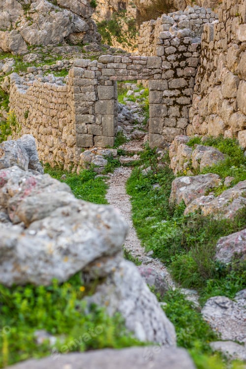 Preview: Stone doorway and narrow path through abandoned spilari village ruins above kotor montenegro