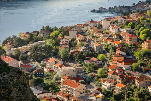 Preview: Elevated view of kotor montenegro and boka kotorska bay with coastal houses and red roofs