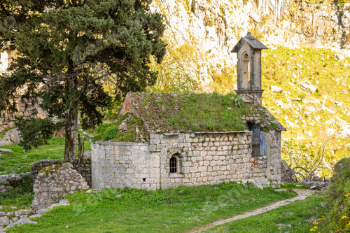 Preview: Abandoned church of saint George in Spilari near Kotor Montenegro surrounded by mountain landscape