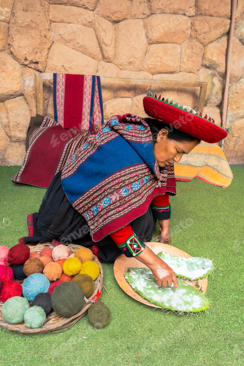 Preview: Peruvian woman processing cochineal for traditional textile dyeing
