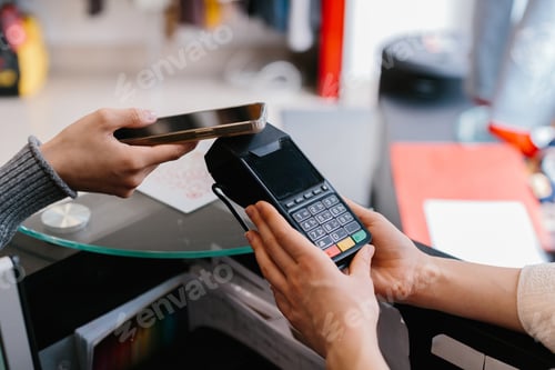 Preview: Customer making contactless payment using smartphone