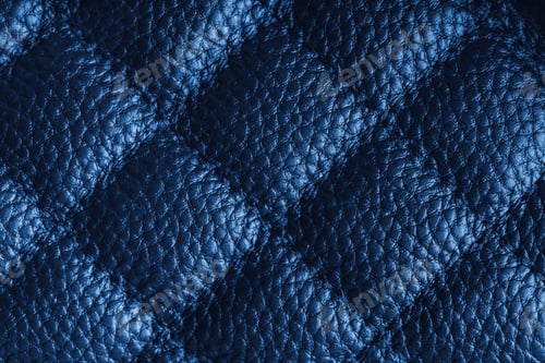 Preview: Macro Of Blue Quilted Leather Texture Background With Stitched Pattern And Shining Metal Effect