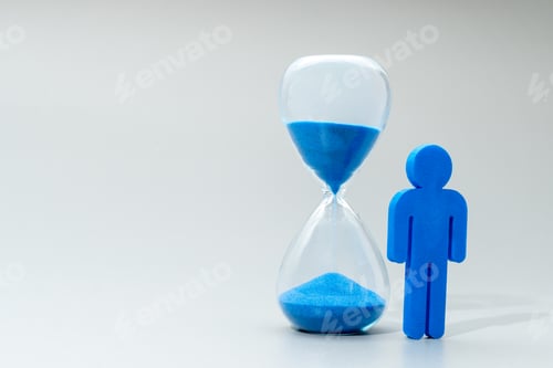Preview: A blue miniature human figure and hourglass.