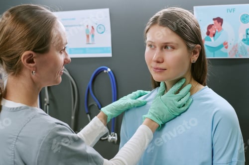 Preview: Adult Woman Receiving Thyroid Examination in Fertility Clinic