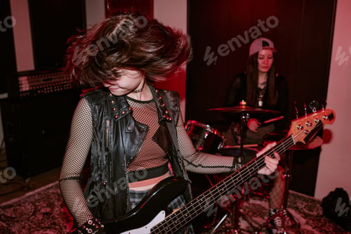 Preview: Teenage Girls Performing Rock Music for Youth Culture Marketing