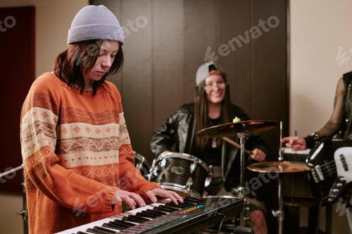 Preview: Teenage Girls Rehearsing Music Band Performance in Studio