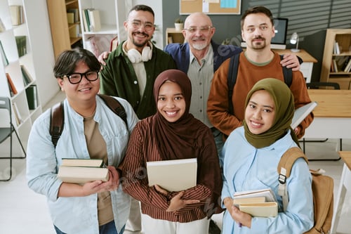 Preview: Portrait of Diverse Migrant Students and Teacher Posing at School