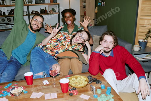 Preview: Diverse Adult Friends Playing Poker during Casual House Party