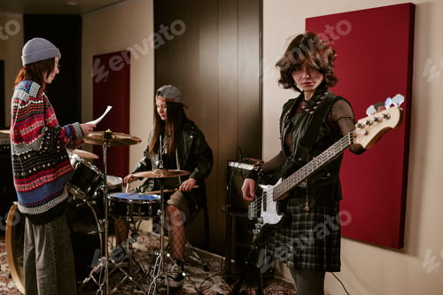Preview: Teenage Girls Rehearsing Music Band Performance in Recording Studio