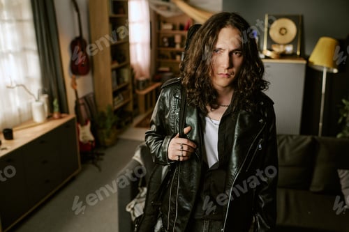 Preview: Portrait of Rock Musician Posing at Home for Music Branding
