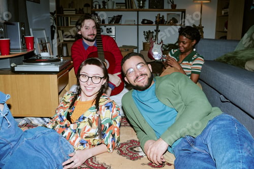 Preview: Portrait of Diverse Friends Relaxing at Home during Social Gathering
