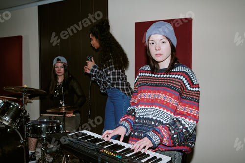 Preview: Portrait of Teenage Girls Rehearsing Music Band Performance