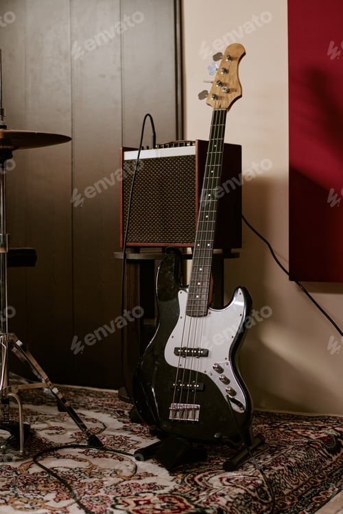 Preview: Bass Guitar Standing in Music Studio for Band Rehearsal Promotion
