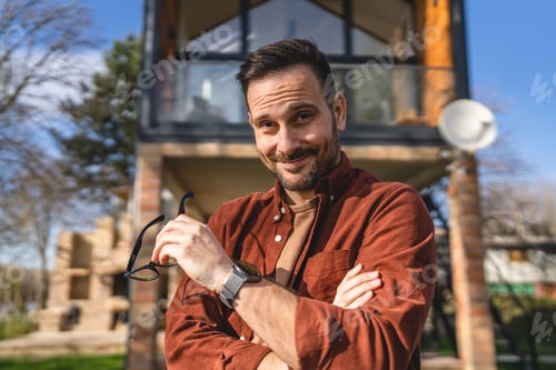 Preview: Portrait of caucasian adult men stand and smile outdoor