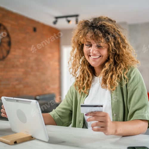 Preview: Adult Woman Caucasian Female Hold Credit Card Online Shopping at Home