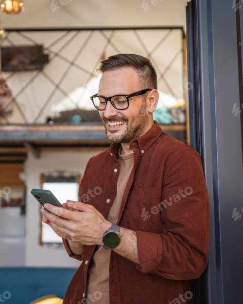 Preview: Man Stand on Balcony Use Smartphone for sms or texting Happy Smile