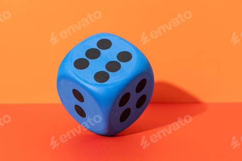 Preview: Blue Dice Showing Number Six on Orange Color Background
