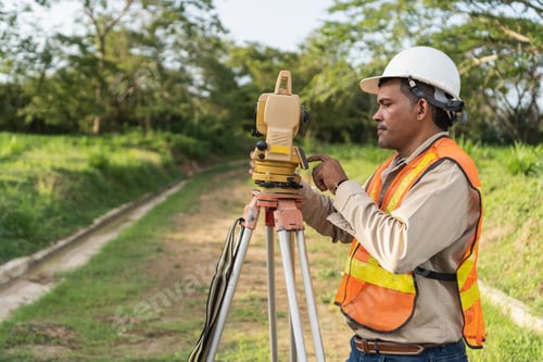 Preview: Civil engineer surveying land with total station instrument