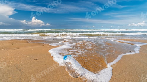 Preview: A plastic bottle washed up on a clean sandy beach, plastic pollution in the world's oceans, environm