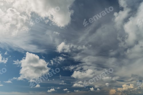 Preview: beautiful sky with cumulus clouds, a background for Earth Day and the rebirth of nature in spring ah