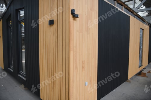 Preview: A new wooden modular prefabricated house inside in manufacturing facility