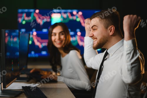 Preview: Traders celebrating financial success watching stock market data