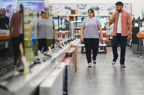 Preview: Couple in shopping. They are looking for a new tv