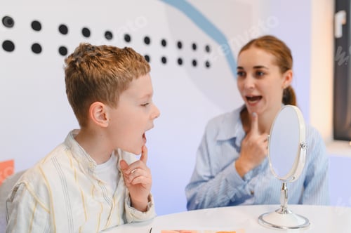 Preview: Child receiving speech therapy with female therapist