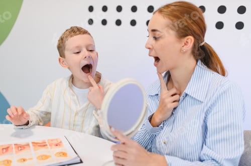 Preview: Speech therapist assisting boy with articulation during therapy