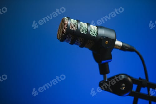 Preview: Close up shot of podcast microphone used to record conversations for internet livestreaming show. St