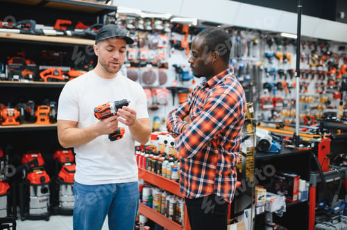 Preview: The seller helps the buyer choose a screwdriver in a hardware store.