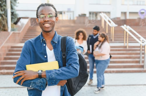 Preview: Young black male college student smiling at campus
