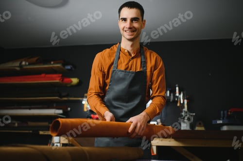 Preview: Banner tailor industry craftsman. Leather rolls and tools for handmade craft in workshop