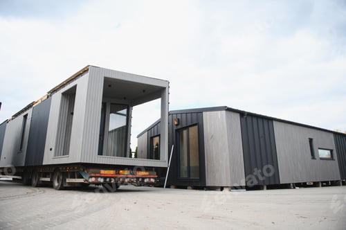 Preview: Modular house sections transporting on flatbed truck