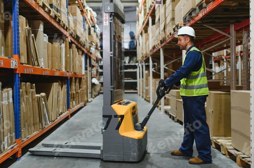 Preview: Storehouse manager supervising the lift truck operator