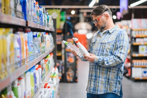 Preview: In Supermarket, Man Carefully Chooses Detergent for Dishes