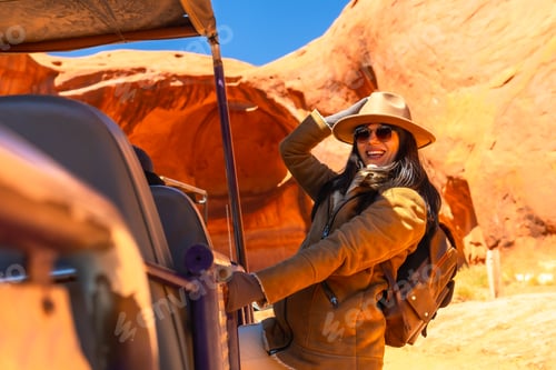 Preview: Woman smiling enjoying navajo jeep tour in monument valley