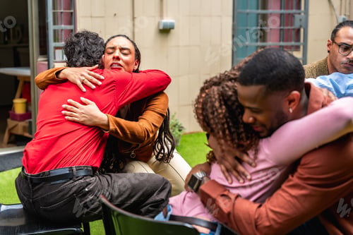 Preview: Diverse adults finding emotional support in group therapy session